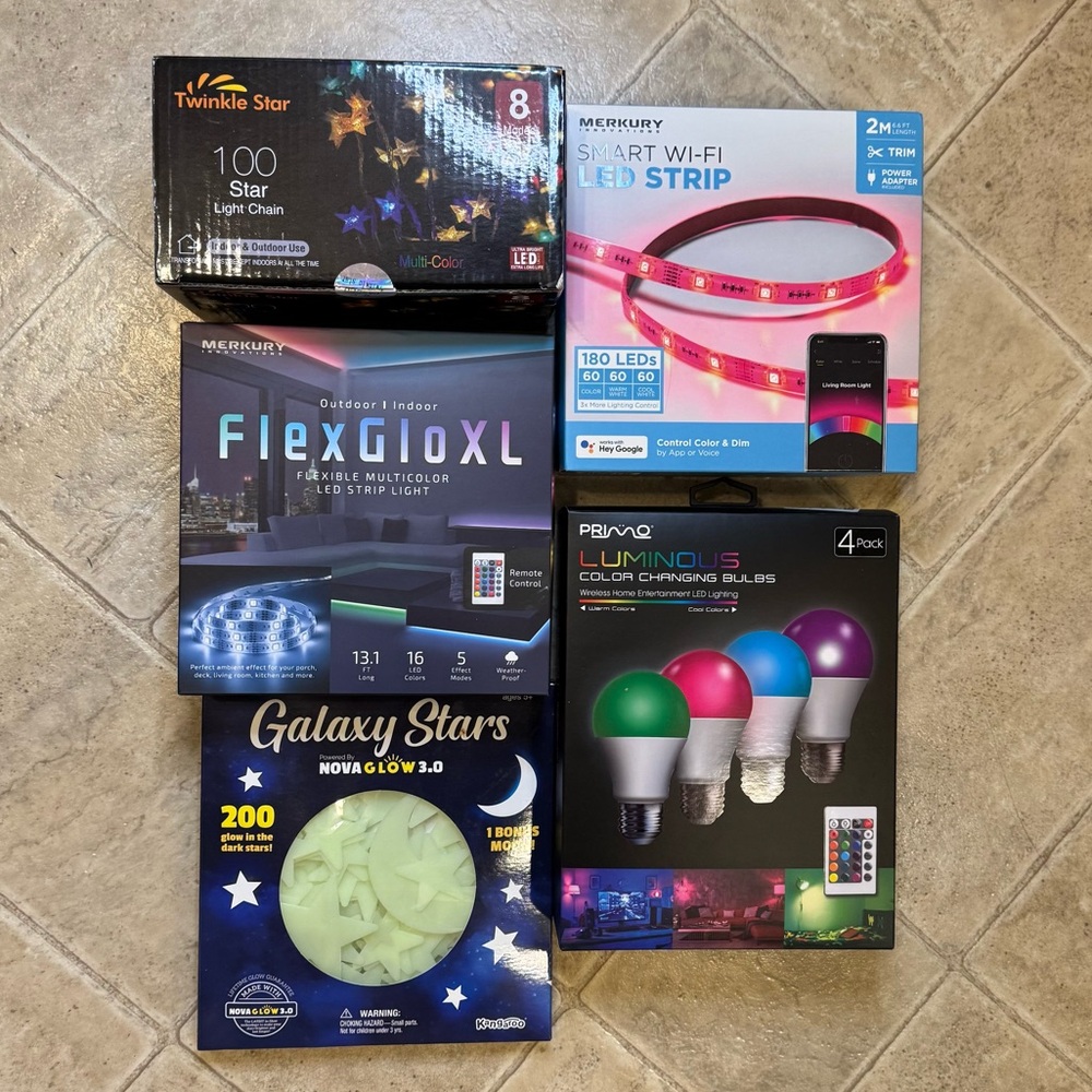 Lot of colorful lightbulbs light strips glow in the dark stars twinkle lights
